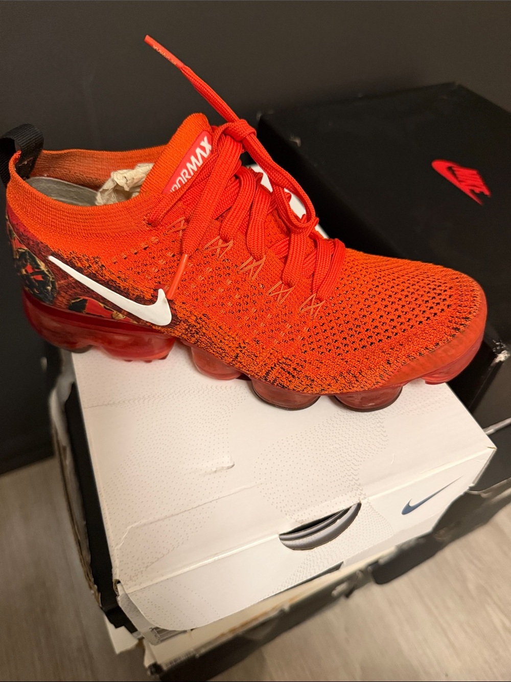 Nike Kids' Bright Orange Flyknit VaporMax Sneaker with White Swoosh